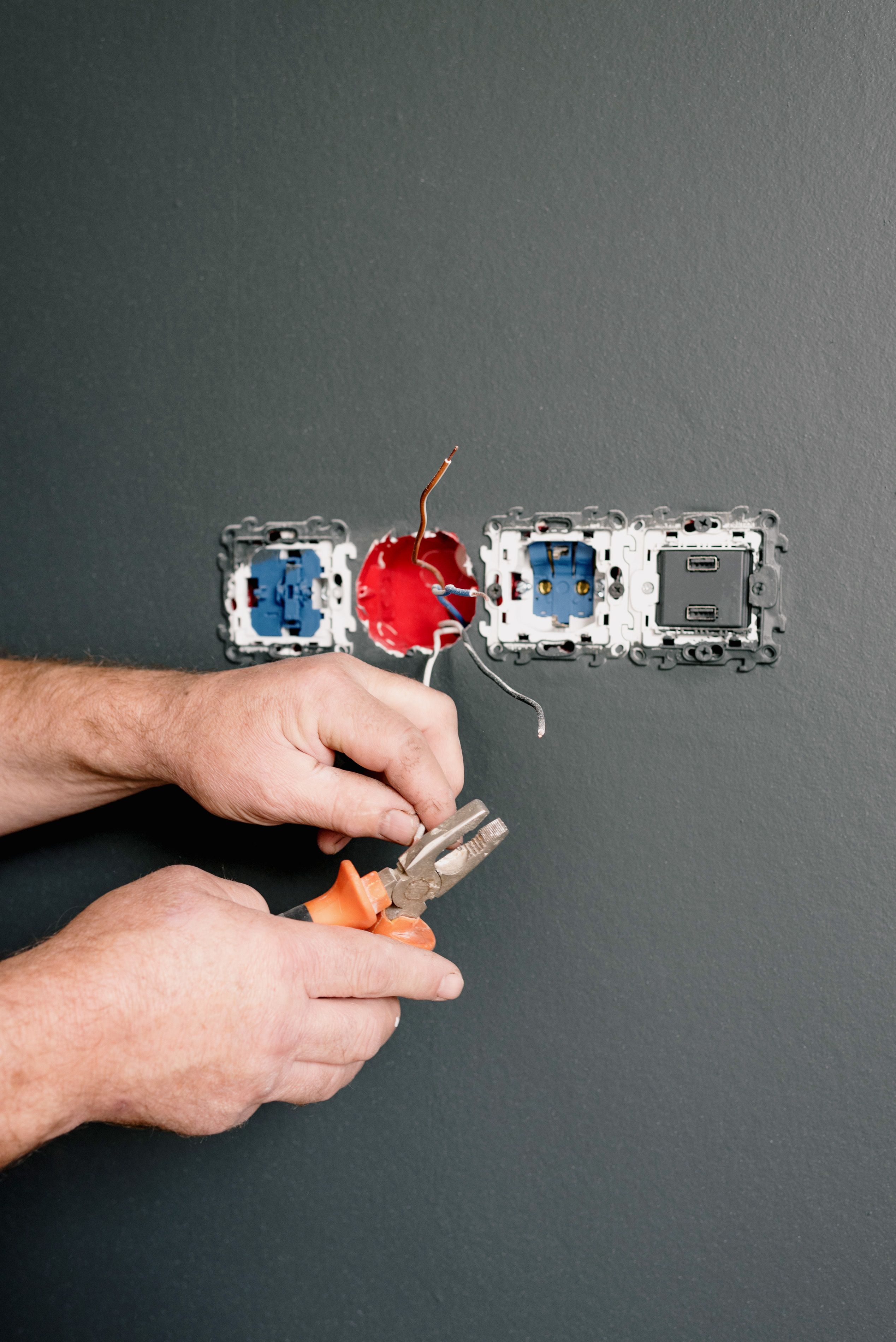 Electrician installing residential electrical wiring